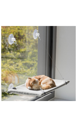 https://cdn.shopify.com/s/files/1/0916/7627/9129/files/Trixie_Colchao_Fino_Hammock_p_Janela.png?v=1771339521